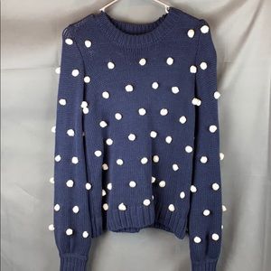 Navy sweater with poms